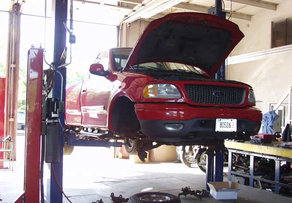 Evans Automotive Repair Colchester Connecticut Car Being Aligned
